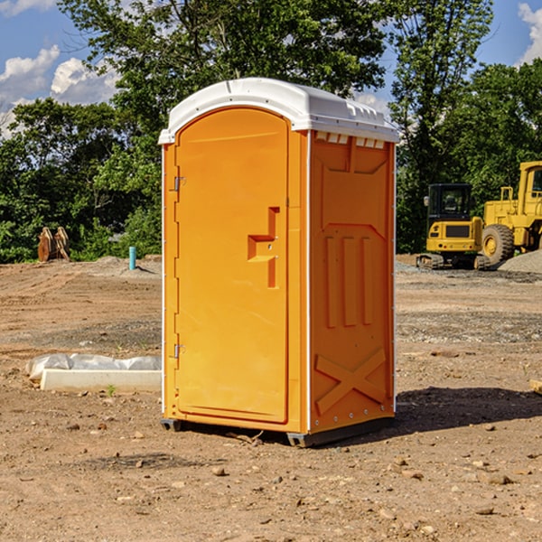 how often are the portable restrooms cleaned and serviced during a rental period in Troup County